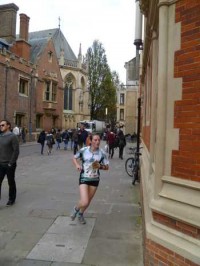 Carrie sprinting through the streets