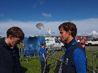 Vokesy and Ben gaze at each other. More interesting TV truck in the background. Photo credit: Dan Safka